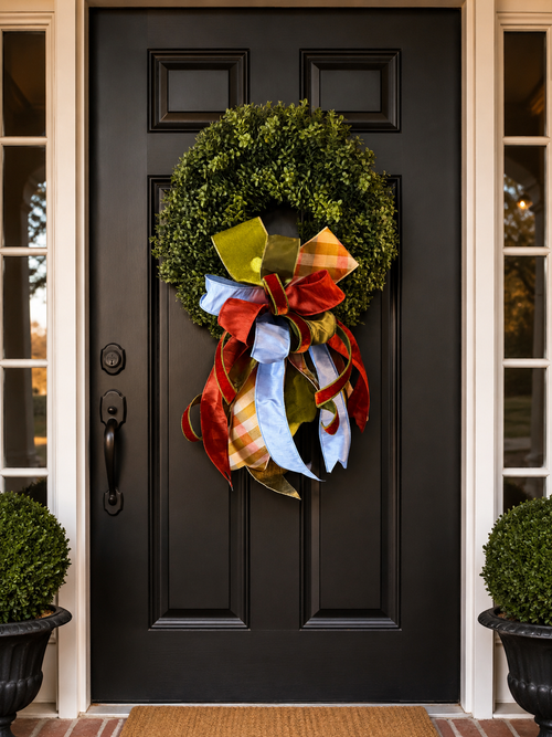 Autumn in the South bow with velvet red, olive gold, orange plaid, and powder blue ribbon on a boxwood wreath