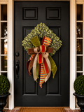 The Autumn Estate bow with olive velvet, crimson, burlap gold, brown velvet, and multicolor stripe ribbon on a square preserved wreath